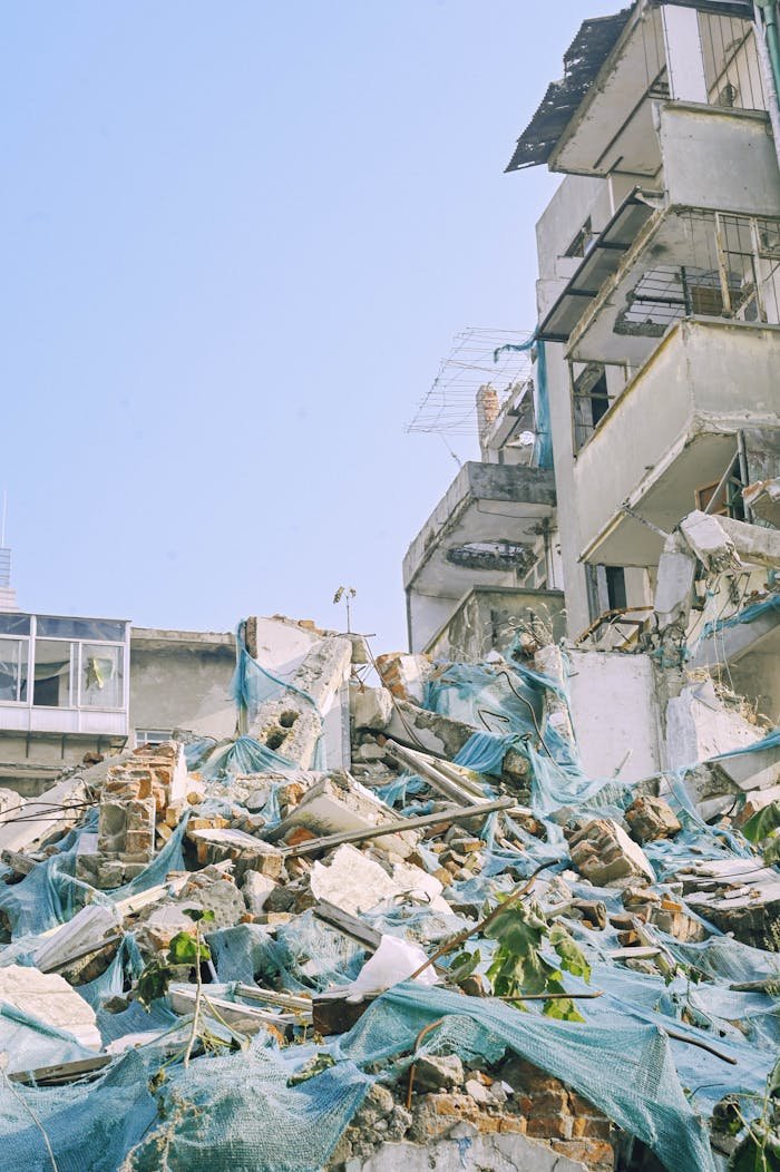 Mastering the First Impression: Your intriguing post title goes here Demolished urban building with rubble and debris, showcasing construction dismantling.